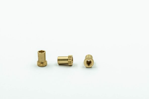 Small brass turned inserts